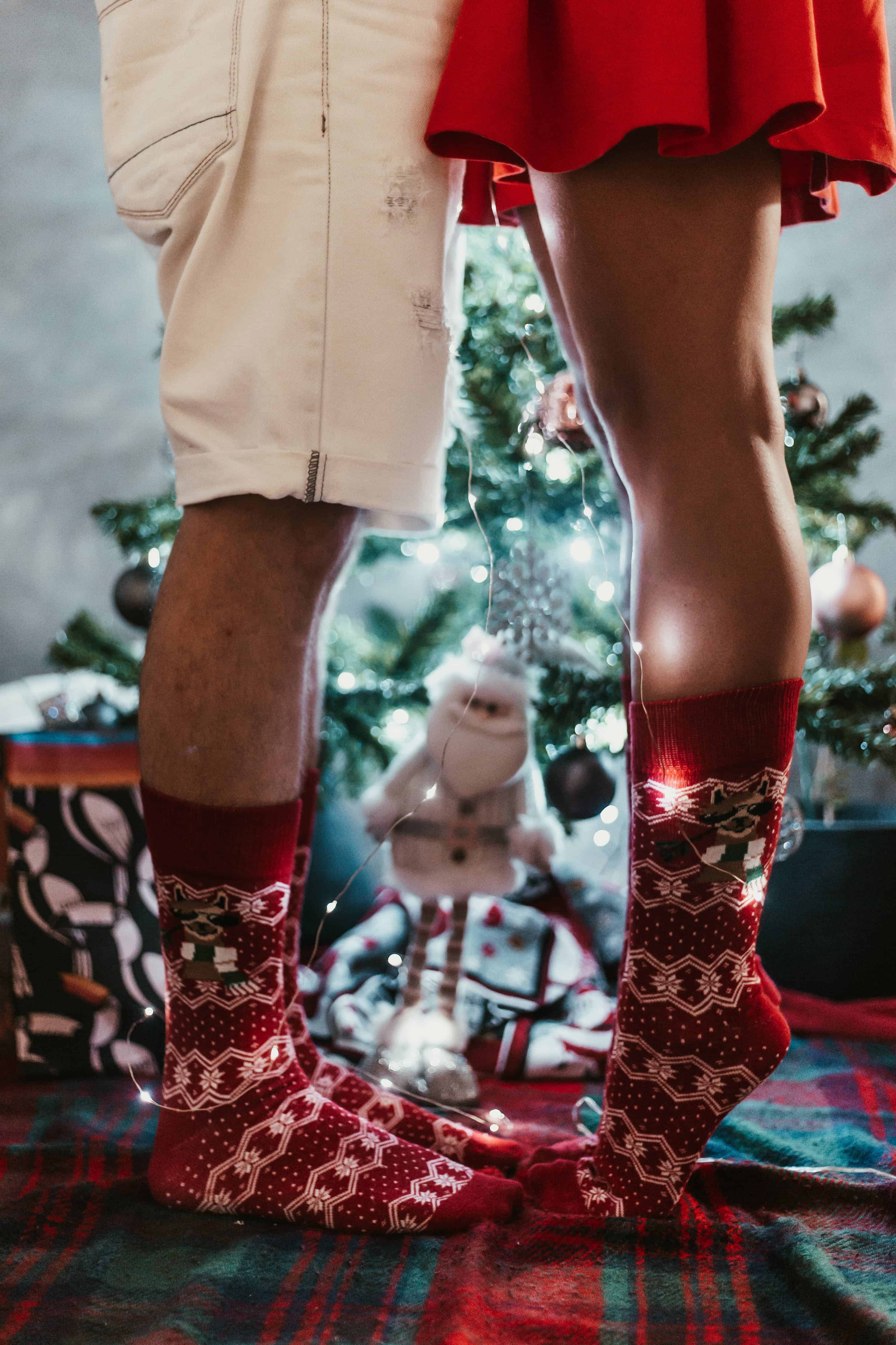 Couple Wearing Red Christmas Socks