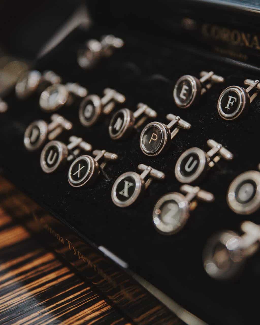 black and gray Corona typewriter