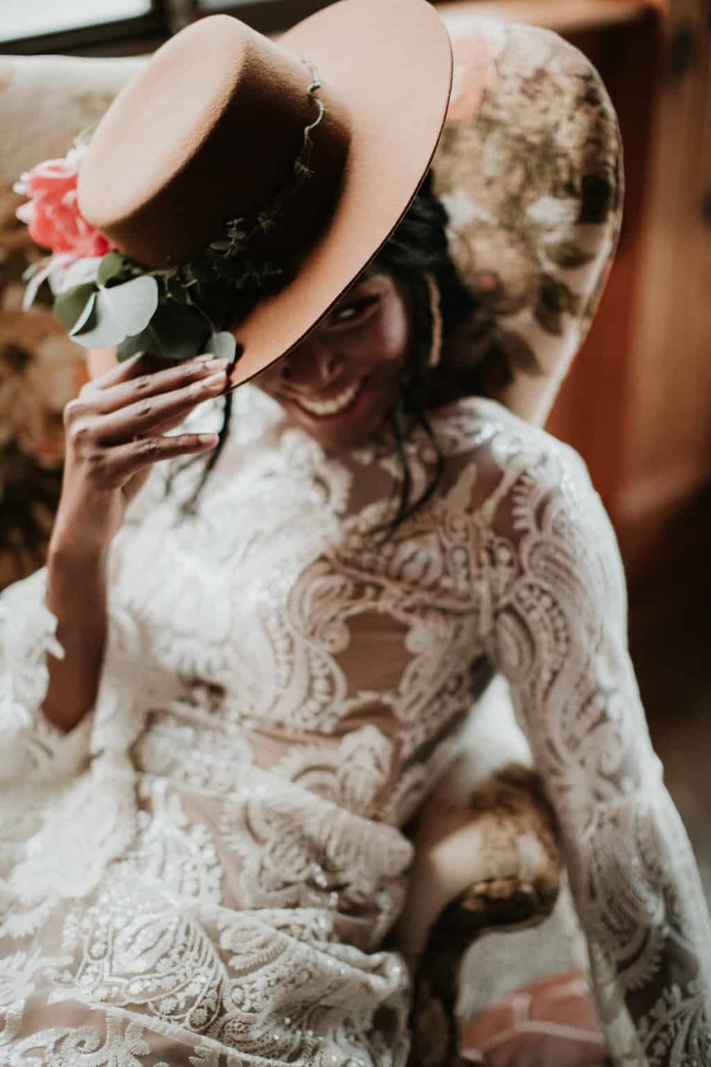 Woman In White Lace Long Sleeve Dress Wearing A Hat