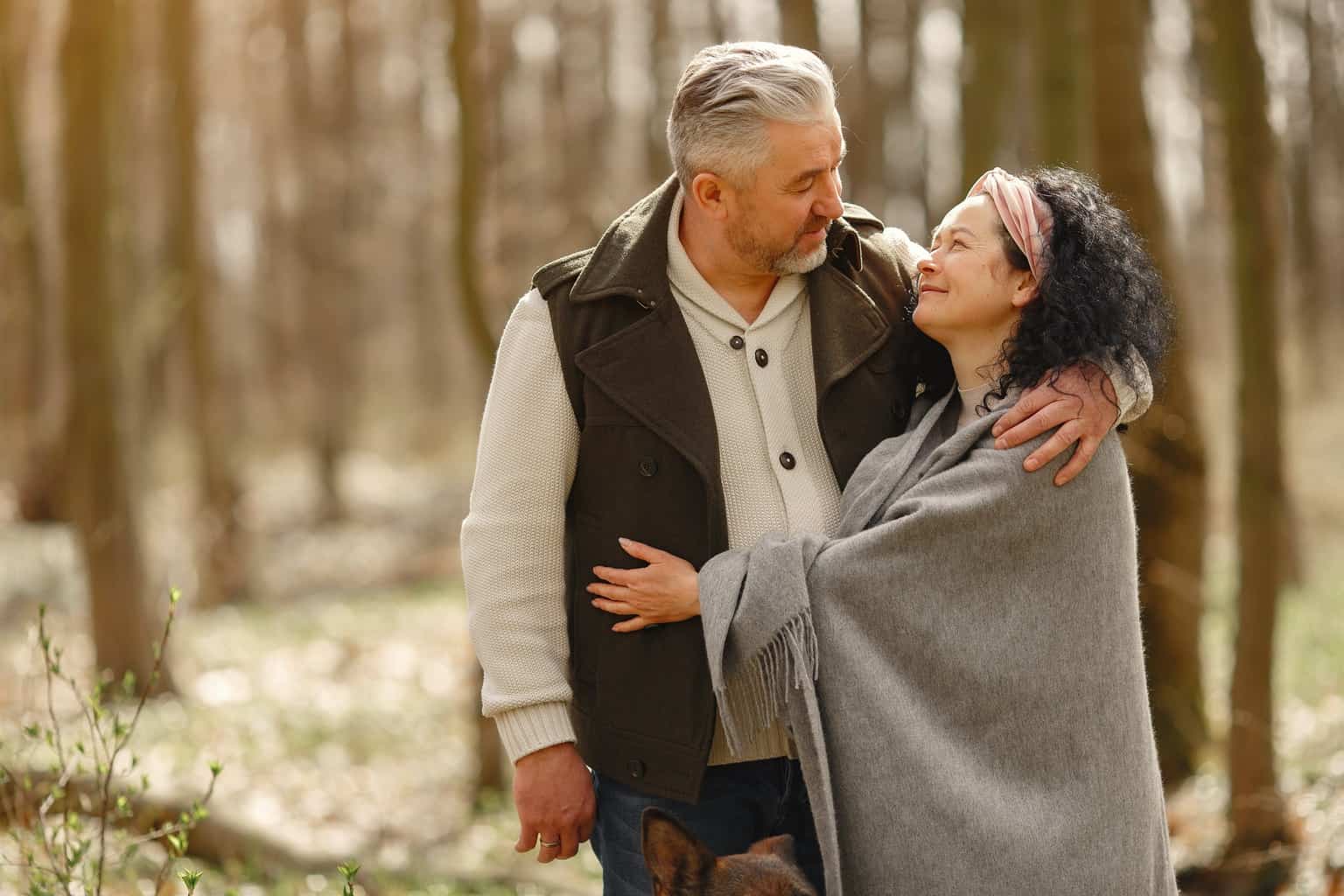 Photo of Couple Smiling While Looking at Each Other