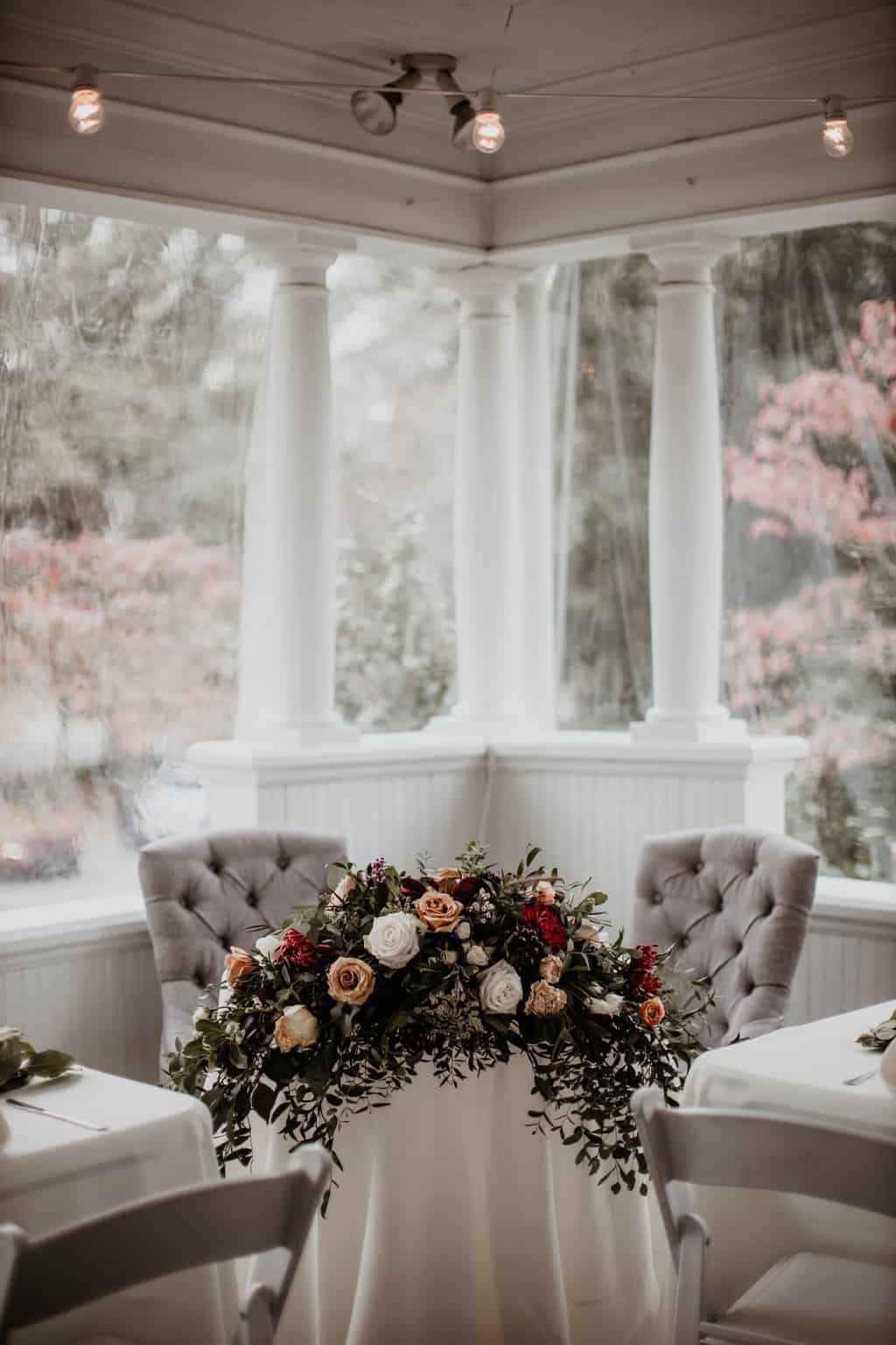 Pink and White Flowers on White Table