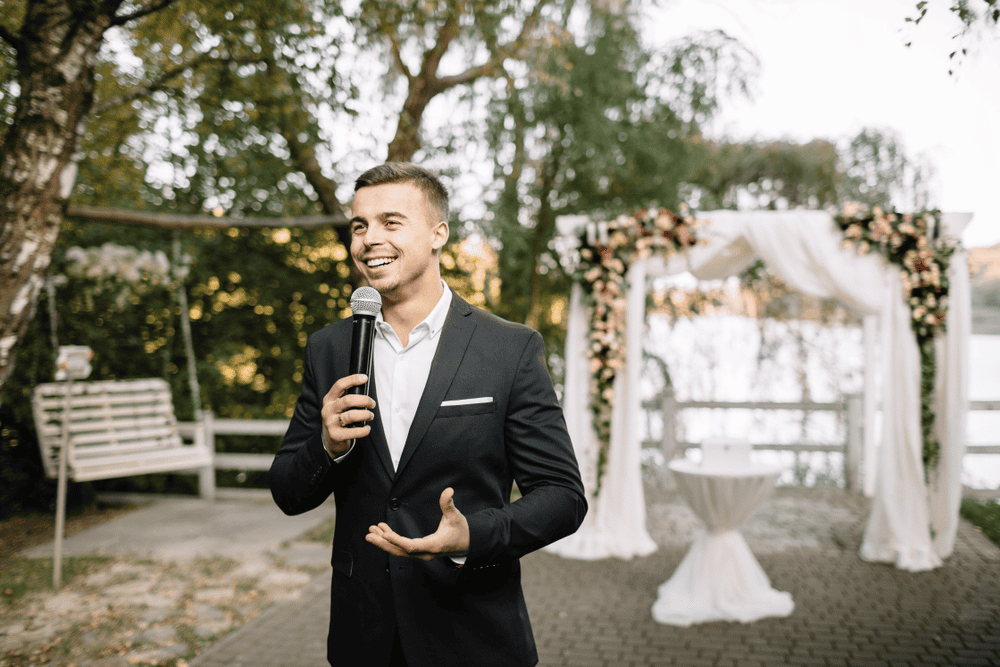 Elegant man with a microphone talking speech